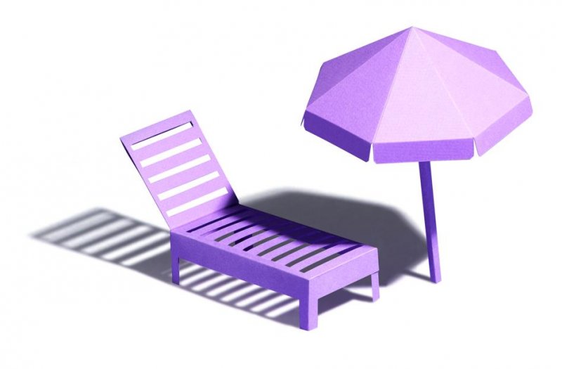 Purple sun lounger and umbrella
