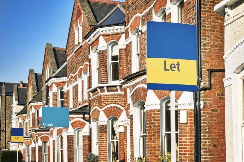 Houses with To Let signs outside