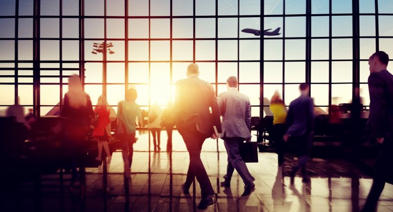 silhouette of couple in an airport