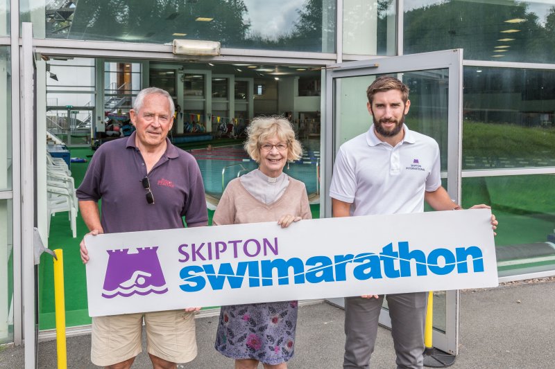 Skipton Swimarathon Beneficiaries holding large banner