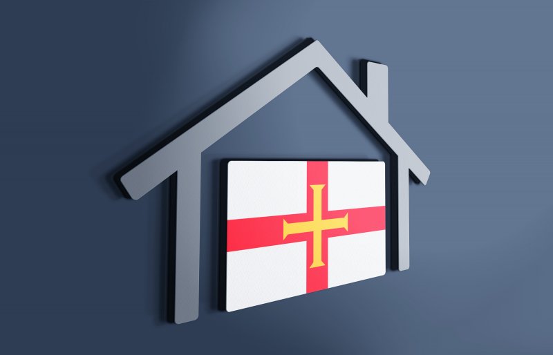 Guernsey Flag with house silhouette 