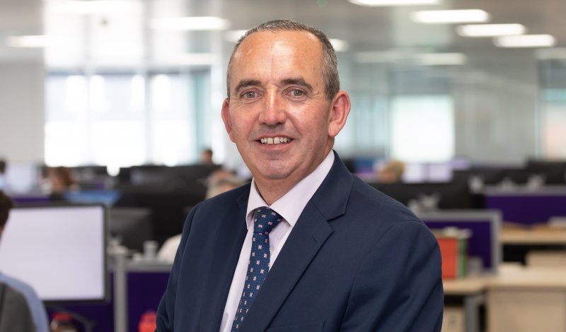 man smiling in Skipton offices