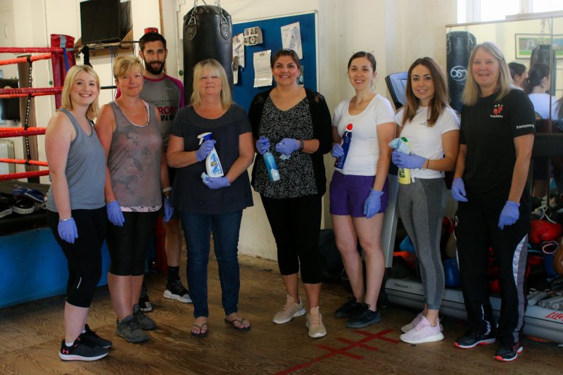people smiling in boxing club