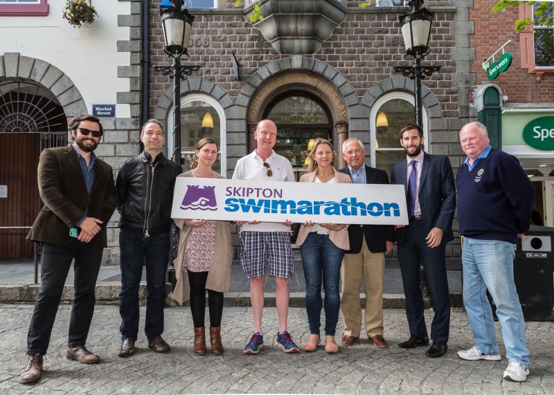 Skipton Swimarathon Beneficiaries holding large banner