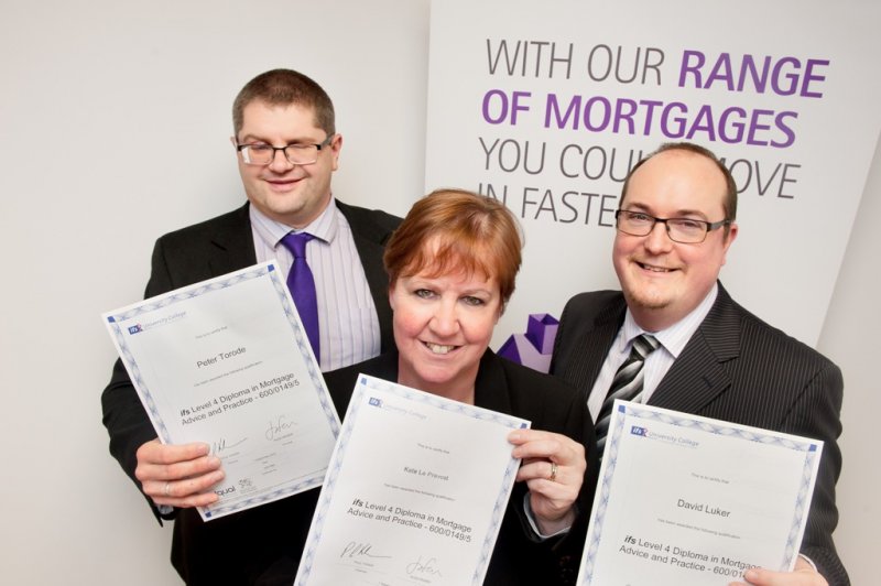 Skipton staff holding mortgage awards